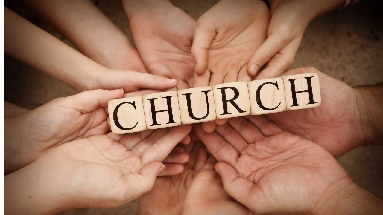 hands holding church