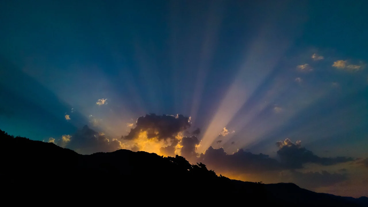 Rays of sunshine breaking through the clouds