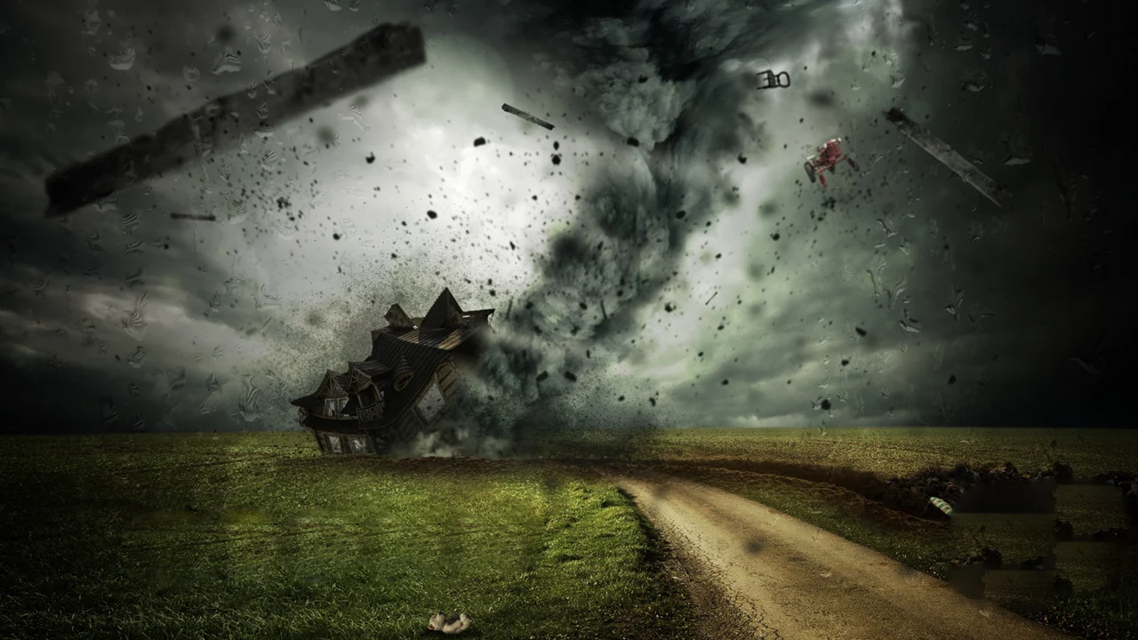 tornado hitting a house with debris flying everywhere